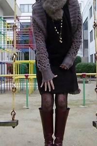 this girl in pantyhose and heels toying with her twat